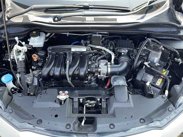 ホンダ ヴェゼル ハイブリッド Z ホンダセンシング 山口県 2018(平30)年 5.9万km クリスタルブラックパール 純正9インチメモリナビ/・フルセグテレビ/・Bluetooth接続/・CD/DVD再生/・AM/FMラジオ/・USB/ipod接続/バックカメラ/ETC/ルーフレール/スマートキー/プッシュスタート/Honda SENSING/・衝突軽減ブレーキ/・誤発進抑制機能/・近距離衝突軽減ブレーキ/・歩行者事故低減ステアリング/・路外逸脱抑制機能/・渋滞追従型機能付アダプティブクルーズコントロール/・車線維持支援システム/・トラフィックジャムアシスト/・先行車発進お知らせ機能/・標識認識機能/車両接近通報装置/保証書/取扱説明書/シートヒーター/ドアバイザー