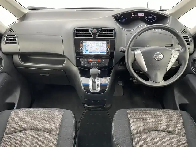 日産 セレナ HWS S HV Vセレ +Sefty 富山県 2015(平27)年 7.4万km ブリリアントホワイトパール 純正ナビ（AM/FM/DVD/BT/ワンセグ）/バックカメラ/ETC/両側パワースライドドア/衝突被害軽減システム/クルーズコントロール/レーンキープアシスト/横滑り防止装置/アイドリングストップ/オートLEDライト/純正アルミホイール/純正フロアマット/革巻きステアリング/スマートキー