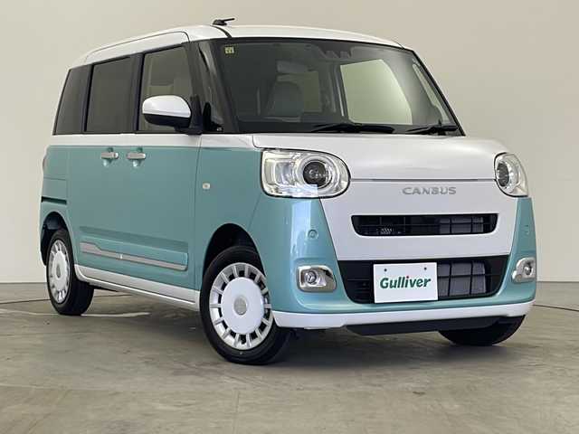ダイハツ ムーヴ キャンバス ストライプス G 秋田県 2023(令5)年 0.8万km シャイニングホワイトパール/ファインミントメタリック 社外ナビ(FM AM BT)/バックカメラ/両側パワースライドドア/横滑り防止システム/ETC/衝突軽減システム/前席シートヒーター/コーナーセンサー/USBジャック/LEDヘッドライト/LEDフォグランプ/スマートキー/スペアキー/プッシュスタート/ステアリングリモコン/電動格納ミラー/アイドリングストップ/純正フロアマット