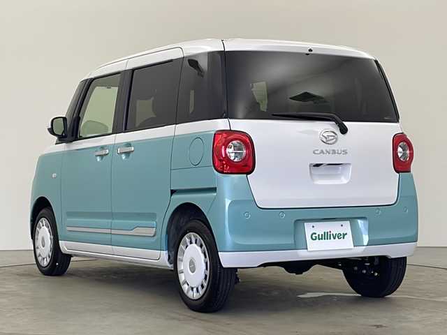 ダイハツ ムーヴ キャンバス ストライプス G 秋田県 2023(令5)年 0.8万km シャイニングホワイトパール/ファインミントメタリック 社外ナビ(FM AM BT)/バックカメラ/両側パワースライドドア/横滑り防止システム/ETC/衝突軽減システム/前席シートヒーター/コーナーセンサー/USBジャック/LEDヘッドライト/LEDフォグランプ/スマートキー/スペアキー/プッシュスタート/ステアリングリモコン/電動格納ミラー/アイドリングストップ/純正フロアマット