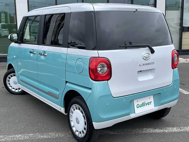 ダイハツ ムーヴ キャンバス ストライプス G 道東・釧路十勝 2023(令5)年 0.8万km シャイニングホワイトパール/ファインミントメタリック ・４WD/・社外メモリナビ(ラジオ BT)/・バックカメラ/・両側パワースライドドア/・衝突被害軽減ブレーキ/・横滑り防止装置/・ETC/・前席シートヒーター/・コーナーセンサー/・LEDヘッドライト/・LEDフォグランプ/・スマートキー/・プッシュスタート/・ステアリングリモコン/・電動格納ミラー/・アイドリングストップ/・純正フロアマット