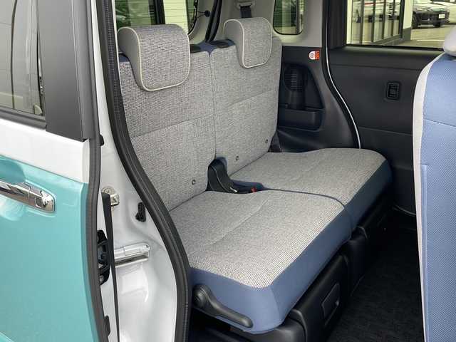 ダイハツ ムーヴ キャンバス ストライプス G 道東・釧路十勝 2023(令5)年 0.8万km シャイニングホワイトパール/ファインミントメタリック ・４WD/・社外メモリナビ(ラジオ BT)/・バックカメラ/・両側パワースライドドア/・衝突被害軽減ブレーキ/・横滑り防止装置/・ETC/・前席シートヒーター/・コーナーセンサー/・LEDヘッドライト/・LEDフォグランプ/・スマートキー/・プッシュスタート/・ステアリングリモコン/・電動格納ミラー/・アイドリングストップ/・純正フロアマット