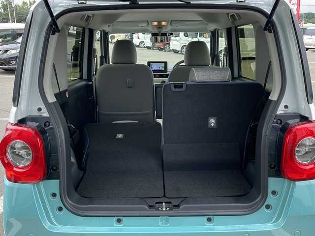 ダイハツ ムーヴ キャンバス ストライプス G 道東・釧路十勝 2023(令5)年 0.8万km シャイニングホワイトパール/ファインミントメタリック ・４WD/・社外メモリナビ(ラジオ BT)/・バックカメラ/・両側パワースライドドア/・衝突被害軽減ブレーキ/・横滑り防止装置/・ETC/・前席シートヒーター/・コーナーセンサー/・LEDヘッドライト/・LEDフォグランプ/・スマートキー/・プッシュスタート/・ステアリングリモコン/・電動格納ミラー/・アイドリングストップ/・純正フロアマット