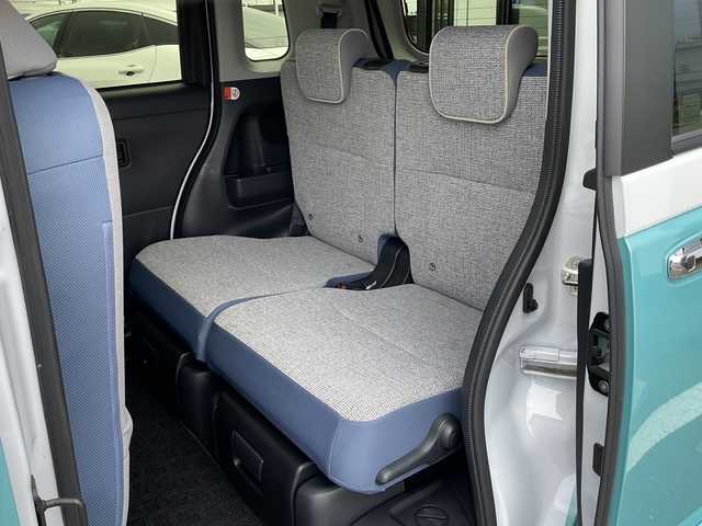 ダイハツ ムーヴ キャンバス ストライプス G 道東・釧路十勝 2023(令5)年 0.8万km シャイニングホワイトパール/ファインミントメタリック ・４WD/・社外メモリナビ(ラジオ BT)/・バックカメラ/・両側パワースライドドア/・衝突被害軽減ブレーキ/・横滑り防止装置/・ETC/・前席シートヒーター/・コーナーセンサー/・LEDヘッドライト/・LEDフォグランプ/・スマートキー/・プッシュスタート/・ステアリングリモコン/・電動格納ミラー/・アイドリングストップ/・純正フロアマット