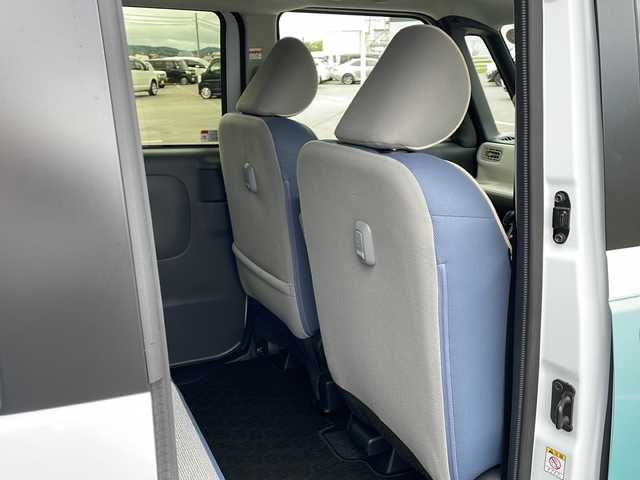 ダイハツ ムーヴ キャンバス ストライプス G 道東・釧路十勝 2023(令5)年 0.8万km シャイニングホワイトパール/ファインミントメタリック ・４WD/・社外メモリナビ(ラジオ BT)/・バックカメラ/・両側パワースライドドア/・衝突被害軽減ブレーキ/・横滑り防止装置/・ETC/・前席シートヒーター/・コーナーセンサー/・LEDヘッドライト/・LEDフォグランプ/・スマートキー/・プッシュスタート/・ステアリングリモコン/・電動格納ミラー/・アイドリングストップ/・純正フロアマット