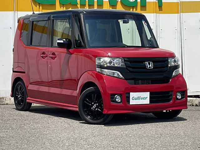 ホンダ Ｎ ＢＯＸ カスタム G Lパッケージ 静岡県 2016(平28)年 5.8万km ミラノレッド ワンオーナー/社外メモリーナビ＆ワンセグＴＶ/（ＤＶＤ＆ＣＤ＆ＢＴ）/バックカメラ/ビルトインＥＴＣ/前方ドライブレコーダー/左側パワースライドドア/革調シートカバー/革巻きステアリング/ステアリングリモコン/アイドリングストップ/純正エアロ/純正１４inアルミホイール/オートライト/ＨＩＤライト/フォグランプ/電動格納ミラー/スマートキー/プッシュスタート/Ｗエアバッグ/横滑り防止装置/ＡＢＳ/ドアバイザー/フロアマット/新車保証書/取扱説明書/スマートスペアキー有