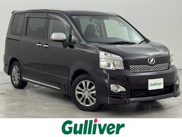 トヨタ ヴォクシー ZS 煌Z 福岡県 2013(平25)年 8.6万km ボルドーマイカメタリック 純正９型ナビ（フルセグＴＶ）　/バックカメラ　/ビルトインＥＴＣ　/３６０°ドライブレコーダー　/パドルシフト　/両側電動スライドドア　/ハーフレザー　/プッシュスタート　/電動格納式ドアミラー　/純正１６インチＡＷ