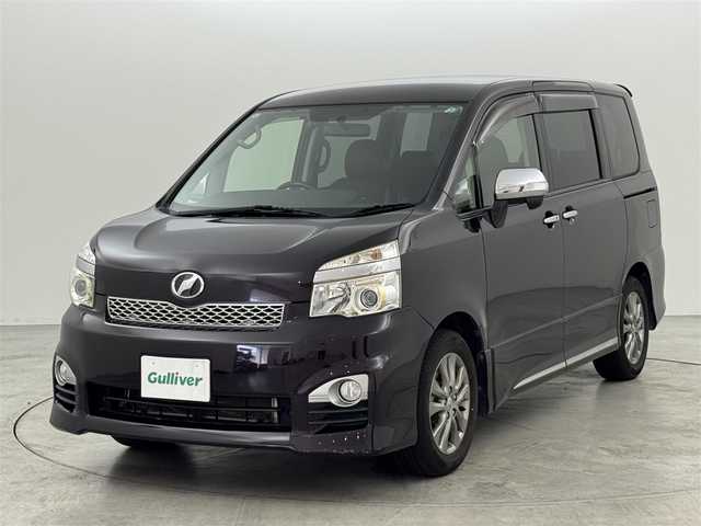 トヨタ ヴォクシー ZS 煌Z 福岡県 2013(平25)年 8.6万km ボルドーマイカメタリック 純正９型ナビ（フルセグＴＶ）　/バックカメラ　/ビルトインＥＴＣ　/３６０°ドライブレコーダー　/パドルシフト　/両側電動スライドドア　/ハーフレザー　/プッシュスタート　/電動格納式ドアミラー　/純正１６インチＡＷ