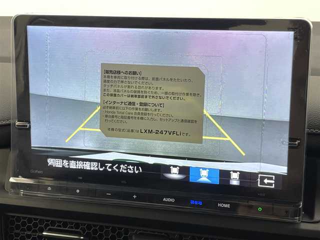ホンダ ステップワゴン スパーダ eHEV 熊本県 2025(令7)年 0.1万km未満 クリスタルブラックパール 登録済未使用車/純正ナビ LXM-247VFLi（ＣＤ・ＤＶＤ・フルセグ・ＢＴ・ＳＤ・ＵＳＢ）/バックカメラ　/両側パワースライドドア　/前後クリアランスソナー　/前席シートヒーター　/ホンダセンシング/・衝突軽減ブレーキ/・レーンキープアシスト/・レーダークルーズコントロール/・踏み間違い防止/・標識認識機能/・後方誤発進抑制機能/・近距離衝突軽減ブレーキ/・車線維持支援システム/・歩行者事故低減ステアリング/・先行車発進お知らせ/・ブラインドスポットモニター/・路外逸脱抑制機能　/横滑り防止　/パワーバックドア/純正１６インチAW/オートライト/LEDヘッドライト/フォグライト/スマートキー/プッシュスタート/スペアキー1本