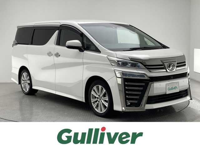 トヨタ ヴェルファイア Z 兵庫県 2018(平30)年 7万km ホワイトパールクリスタルシャイン 純正ディスプレイオーディオ/フルセグ CD DVD BD BT MSV/JBLプレミアムサウンド/純正フリップダウンモニター/レーダークルーズコントロール/プリクラッシュセーフティー/LDA/PKSB/RCTA/RSA/クリアランスソナー/ドライブレコーダー/パノラミックビューモニター/ビルトインETC2.0/LEDヘッドライト/LEDフォグライト/オートライト/オートハイビーム/純正ドアバイザー/スマートキー