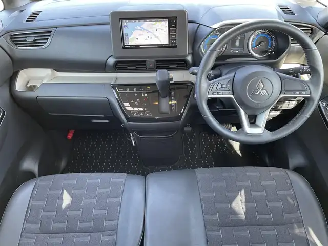 三菱 デリカミニ T 鳥取県 2025(令7)年 1.2万km チタニウムグレーメタリック ワンオーナー/４WD・ターボ車/社外ナビ/フルセグ/DVD/CD/BT/バックカメラ・ETC/ハーフレザーシート/前席シートヒーター/衝突軽減ブレーキ/レーンキープアシスト/片側パワースライドドア/LEDヘッドライト/LEDフォグライト/プッシュエンジンスタート/アイドリングストップ/フロアマット/ドアバイザー/保証書・取扱説明書