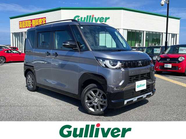 三菱 デリカミニ T 鳥取県 2025(令7)年 1.2万km チタニウムグレーメタリック ワンオーナー/４WD・ターボ車/社外ナビ/フルセグ/DVD/CD/BT/バックカメラ・ETC/ハーフレザーシート/前席シートヒーター/衝突軽減ブレーキ/レーンキープアシスト/片側パワースライドドア/LEDヘッドライト/LEDフォグライト/プッシュエンジンスタート/アイドリングストップ/フロアマット/ドアバイザー/保証書・取扱説明書