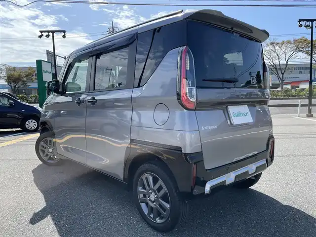 三菱 デリカミニ T 鳥取県 2025(令7)年 1.2万km チタニウムグレーメタリック ワンオーナー/４WD・ターボ車/社外ナビ/フルセグ/DVD/CD/BT/バックカメラ・ETC/ハーフレザーシート/前席シートヒーター/衝突軽減ブレーキ/レーンキープアシスト/片側パワースライドドア/LEDヘッドライト/LEDフォグライト/プッシュエンジンスタート/アイドリングストップ/フロアマット/ドアバイザー/保証書・取扱説明書