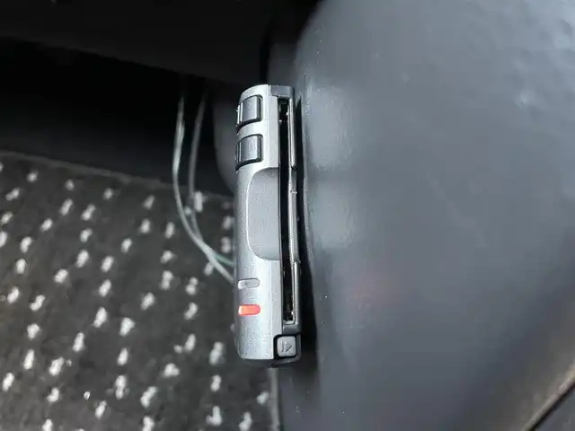 三菱 デリカミニ T 鳥取県 2025(令7)年 1.2万km チタニウムグレーメタリック ワンオーナー/４WD・ターボ車/社外ナビ/フルセグ/DVD/CD/BT/バックカメラ・ETC/ハーフレザーシート/前席シートヒーター/衝突軽減ブレーキ/レーンキープアシスト/片側パワースライドドア/LEDヘッドライト/LEDフォグライト/プッシュエンジンスタート/アイドリングストップ/フロアマット/ドアバイザー/保証書・取扱説明書