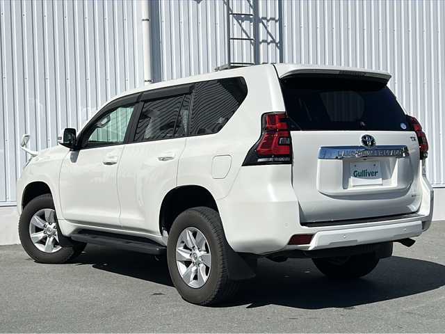 トヨタ ランドクルーザー プラド TX Lパッケージ 三重県 2019(令1)年 2.4万km ホワイトパールクリスタルシャイン ALPINE9型ナビ /ALPINE後席モニター /サンルーフ /バックカメラ /黒革シート/前方ドライブレコーダー/前席パワーシート /前席エアーシート /電動格納サードシート/ビルトインETC /コーナーセンサー /レーダークルーズコントロール/レーンキープアシスト/衝突軽減ブレーキ/スペアキー/LEDヘッドライト/オートハイビーム/オートライト/フロアマット/革巻きステアリング/ステアリングスイッチ/電動格納ミラー/禁煙車