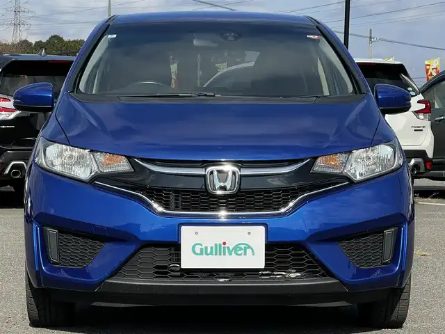 ホンダ フィット 13G Fパッケージ 道央・札幌 2016(平28)年 8.2万km ブリリアントスポーティブルーメタリック2トーン ４WD/寒冷地仕様/純正オーディオ/AM/FM/CD/AUX/衝突被害軽減ブレーキ/横滑り防止装置/アイドリングストップ/ECON/ワイパーデアイサー/プッシュスタート/スマートキー/ハロゲンヘッドライト/ヘッドライトレベライザー/電動格納ミラー/ヒーテッドドアミラー/ウィンカーミラー/社外フロアマット/スペアキー