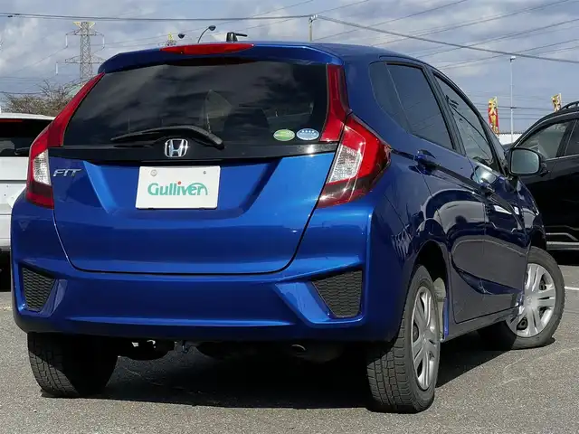 ホンダ フィット 13G Fパッケージ 道央・札幌 2016(平28)年 8.2万km ブリリアントスポーティブルーメタリック2トーン ４WD/寒冷地仕様/純正オーディオ/AM/FM/CD/AUX/衝突被害軽減ブレーキ/横滑り防止装置/アイドリングストップ/ECON/ワイパーデアイサー/プッシュスタート/スマートキー/ハロゲンヘッドライト/ヘッドライトレベライザー/電動格納ミラー/ヒーテッドドアミラー/ウィンカーミラー/社外フロアマット/スペアキー