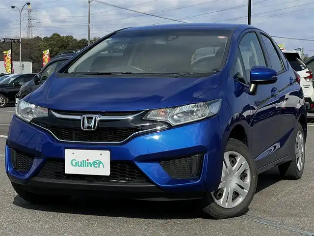 ホンダ フィット 13G Fパッケージ 道央・札幌 2016(平28)年 8.2万km ブリリアントスポーティブルーメタリック2トーン ４WD/寒冷地仕様/純正オーディオ/AM/FM/CD/AUX/衝突被害軽減ブレーキ/横滑り防止装置/アイドリングストップ/ECON/ワイパーデアイサー/プッシュスタート/スマートキー/ハロゲンヘッドライト/ヘッドライトレベライザー/電動格納ミラー/ヒーテッドドアミラー/ウィンカーミラー/社外フロアマット/スペアキー