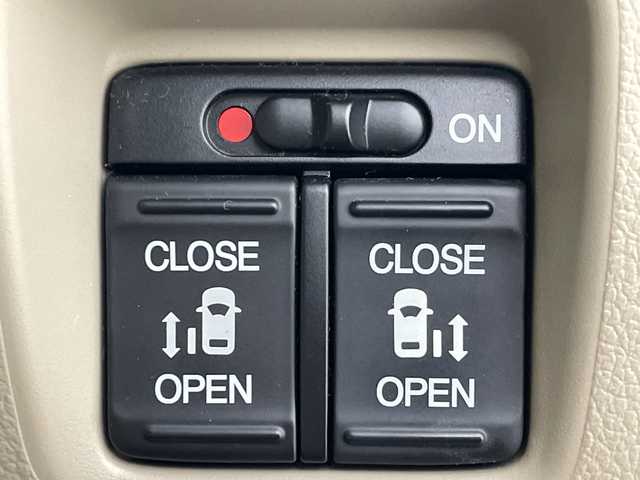 ホンダ Ｎ ＢＯＸ 2トーン G Lパッケージ 群馬県 2015(平27)年 5.2万km プレミアムディープモカパール 禁煙車　純正ナビ　バックカメラ　両側パワースライドドア　横滑り防止　アイドリングストップ　スマートキー　プッシュスタート　スペアキー　オートライト　オートエアコン　純正アルミホイール　電動格納ミラー