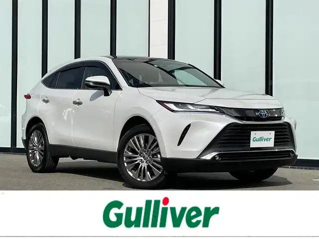 トヨタ ハリアー ハイブリッド Z 大阪府 2023(令5)年 2.1万km プラチナホワイトパールマイカ 純正１２．３型ディスプレイオーディオ（ナビあり）/・Applecarplay/andoroidauto/・フルセグ/BT/ＪＢＬサウンド/調光型ムーンルーフ/トヨタセーフティセンス/・レーダークルーズ/・レーンキープアシスト/・クリアランスソナー/・オートマチックハイビーム/ブラインドスポットモニター/デジタルインナーミラー/ヘッドアップディスプレイ/ハーフレザーシート/パワーシート/パワーバックドア/ドライブレコーダー/２．０ビルトインETC/純正アルミ/スペアキー