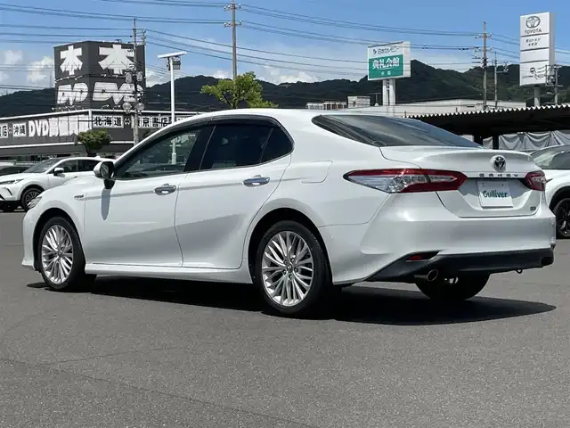 トヨタ カムリ G レザーパッケージ 岡山県 2018(平30)年 8.8万km プラチナホワイトパールマイカ 登録時走行距離87449km/純正8インチナビ/フルセグTV(AM.FM.CD.DVD.BT)/バックカメラ/ビルトインETC2.0/シートヒーター/レーダークルーズコントロール/衝突軽減ブレーキ/レーンキープアシスト/クリアランスソナー/オートマチックハイビーム/パワーバックドア/USB入力端子/純正１８インチAW/純正フロアマット