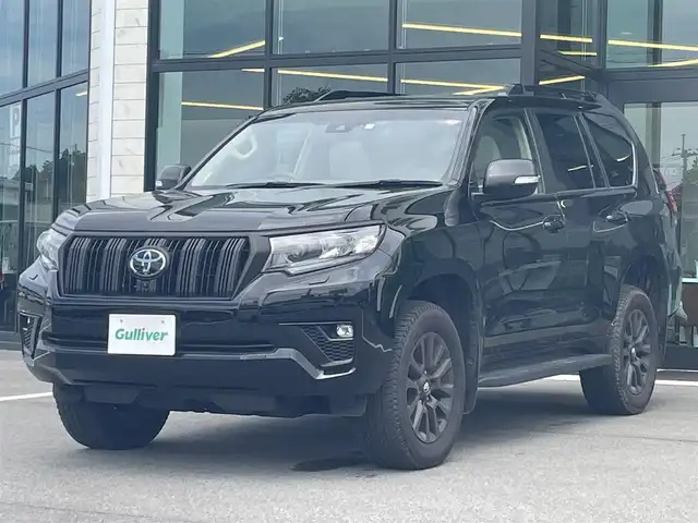 トヨタ ランドクルーザー プラド TX Lパッケージ マットブラED 愛媛県 2023(令5)年 2万km ブラック マットブラックエディション/サンルーフ/プラドスーパーライブサウンドシステム/メーカーオプションナビ/Bluetooth/アラウンドビューモニター/ビルトインETC2.0/本革シート/前席シートヒーター/前席エアシート/ルーフレール/レーダークルーズコントロール/レーンキープアシストシステム/衝突被害軽減ブレーキ/ブラインドスポットモニター/LEDヘッドライト/オートライト/オートマチックハイビーム/フォグランプ/スマートキー/プッシュスタート