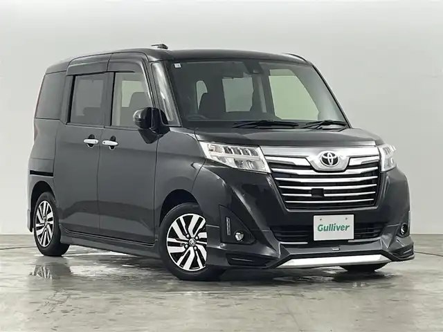 トヨタ ルーミー カスタムG S 福島県 2018(平30)年 2.1万km ブラックマイカメタリック スマートアシスト/・衝突回避支援ブレーキ機能/・車線逸脱警報機能/・アダプティブクルーズコントロール/・オートハイビーム/・アダプティブドライビングビーム/モデリスタエアロ/・フロント/サイド/リアスポイラー/社外HDDナビ/型番:AVIC-RL801/・AM/FM/CD/DVD/BT/SD/フルセグTV/・バックカメラ/・ETC/両側パワースライドドア/ステアリングスイッチ/・チルト式ステアリング/LEDヘッドライト/・オートライト/プッシュスタート/・スマートキー/純正AW/純正フロアマット