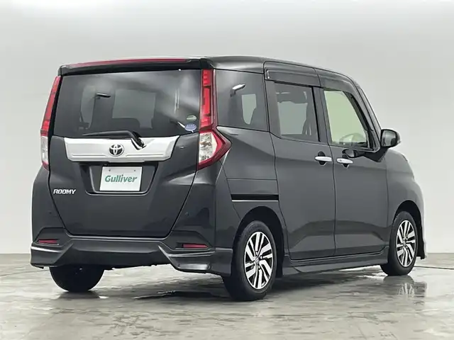 トヨタ ルーミー カスタムG S 福島県 2018(平30)年 2.1万km ブラックマイカメタリック スマートアシスト/・衝突回避支援ブレーキ機能/・車線逸脱警報機能/・アダプティブクルーズコントロール/・オートハイビーム/・アダプティブドライビングビーム/モデリスタエアロ/・フロント/サイド/リアスポイラー/社外HDDナビ/型番:AVIC-RL801/・AM/FM/CD/DVD/BT/SD/フルセグTV/・バックカメラ/・ETC/両側パワースライドドア/ステアリングスイッチ/・チルト式ステアリング/LEDヘッドライト/・オートライト/プッシュスタート/・スマートキー/純正AW/純正フロアマット