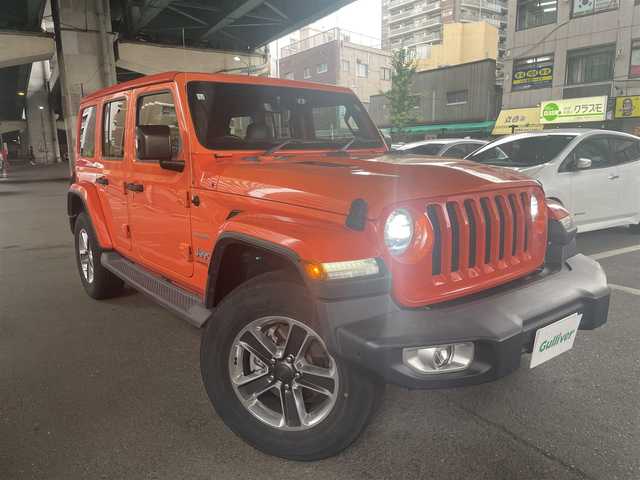クライスラー・ジープ ジープ ラングラー アンリミテッド サハラ ローンチエディション 大阪府 2018(平30)年 4.9万km オレンジ JEEP純正18インチアルミホイール/クルーズコントロール /JEEP純正メモリナビ/・バックカメラ/・Bluetooth/・AM.FM/前席シートヒーター/LEDヘッドライト/特殊形状サンルーフ(手動開閉可能)/アウトサイド フルサイズスペアタイヤ/プッシュスタート/ビルトインETC/ワンオーナー/新車保証書/取扱説明書
