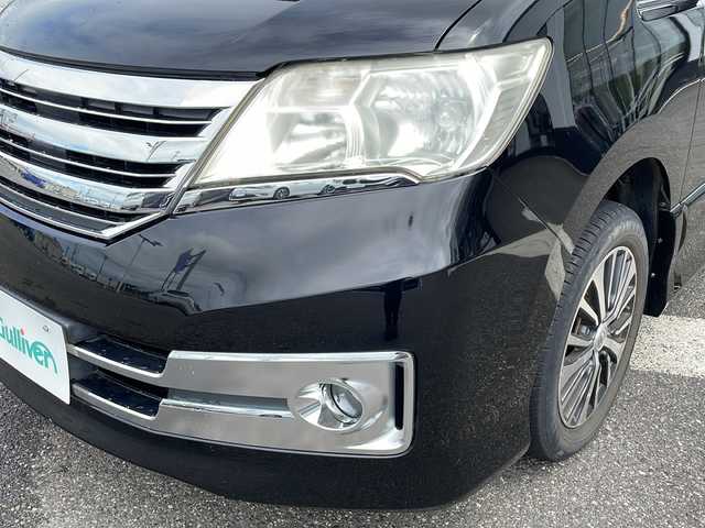 日産 セレナ ライダー 新潟県 2012(平24)年 11万km 黒 純正ナビ/（DTV/DVD/Bluetooth）/アルパイン製フリップダウン/冬タイヤ積載/左パワースライドドア/ビルドインETC/バックカメラ/サンシェード/HIDヘッドライト/フォグランプ/ウィンカーミラー/電格ミラー