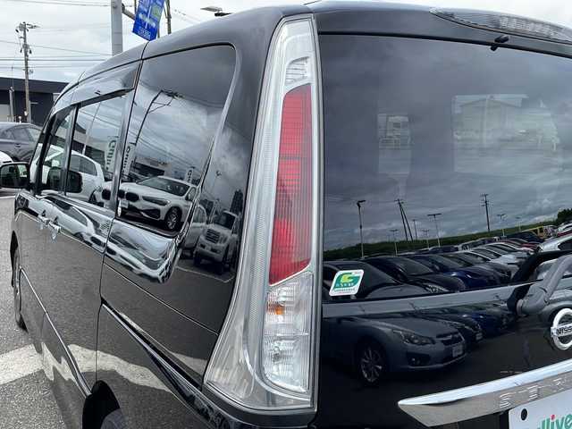 日産 セレナ ライダー 新潟県 2012(平24)年 11万km 黒 純正ナビ/（DTV/DVD/Bluetooth）/アルパイン製フリップダウン/冬タイヤ積載/左パワースライドドア/ビルドインETC/バックカメラ/サンシェード/HIDヘッドライト/フォグランプ/ウィンカーミラー/電格ミラー