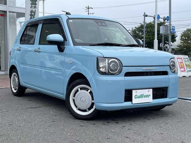ダイハツ ミラ トコット G SA Ⅲ 道央・札幌 2019(平31)年 9.8万km サニーデイブルーメタリック 登録時走行距離97/934km/ワンオーナー/　４　W　D　/寒冷地仕様/スマートアシストIII（レーンキープアシスト/衝突軽減ブレーキ）/純正ナビ（CD/DVD/FM/AM/SD/BT)/フルセグ(走行中視聴可能)/バックカメラ/全周囲カメラ/アイドリングストップ/ドアバイザー/プッシュスタート/パーキングアシスト/USB入力端子/ドライブレコーダー（前方）/シートヒーター（運転席/助手席）/横滑り防止装置/盗難防止装置/オートマチックハイビーム/コーナーセンサー/ヘッドライトレベライザー/ステアリングスイッチ/電動格納ミラー/積込冬タイヤ（スチールホイール/155/65/R14/23年製/溝6ｍｍ）