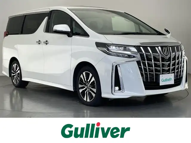 トヨタ アルファード S Cパッケージ 愛知県 2021(令3)年 2.3万km ホワイトパールクリスタルシャイン 純正９型ナビ　ＢＳＭ　三眼ＬＥＤ　純正フリップダウンモニター　デジイン　追従くクルコン　セーフティセンス　ミラキャスト　ｎａｎｏｅ　黒レザ‐　禁煙車　フルセグＴＶ　ＤＶＤ　車線逸脱　衝突軽減　両側パワスラ　エアシート　メモリーシート　１００V充電　ステアリングヒーター　フォグランプ　コーナーセンサー　Bluetooth　サンルーフ　オットマン　