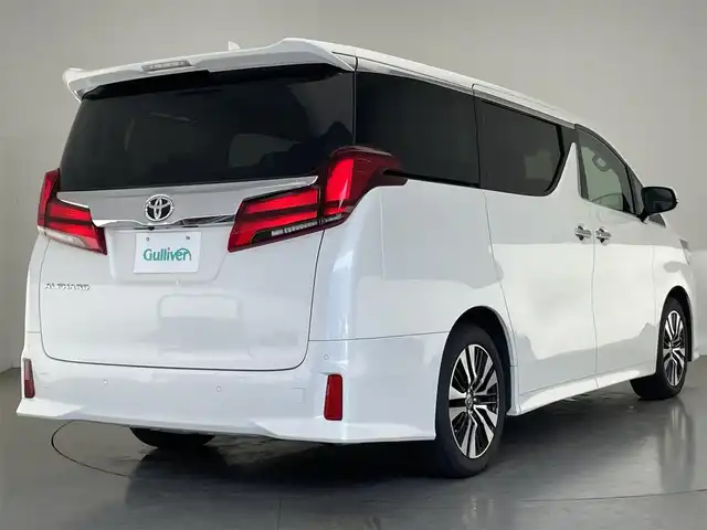トヨタ アルファード S Cパッケージ 愛知県 2021(令3)年 2.3万km ホワイトパールクリスタルシャイン 純正９型ナビ　ＢＳＭ　三眼ＬＥＤ　純正フリップダウンモニター　デジイン　追従くクルコン　セーフティセンス　ミラキャスト　ｎａｎｏｅ　黒レザ‐　禁煙車　フルセグＴＶ　ＤＶＤ　車線逸脱　衝突軽減　両側パワスラ　エアシート　メモリーシート　１００V充電　ステアリングヒーター　フォグランプ　コーナーセンサー　Bluetooth　サンルーフ　オットマン　