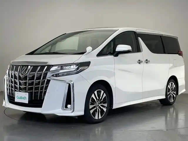 トヨタ アルファード S Cパッケージ 愛知県 2021(令3)年 2.3万km ホワイトパールクリスタルシャイン 純正９型ナビ　ＢＳＭ　三眼ＬＥＤ　純正フリップダウンモニター　デジイン　追従くクルコン　セーフティセンス　ミラキャスト　ｎａｎｏｅ　黒レザ‐　禁煙車　フルセグＴＶ　ＤＶＤ　車線逸脱　衝突軽減　両側パワスラ　エアシート　メモリーシート　１００V充電　ステアリングヒーター　フォグランプ　コーナーセンサー　Bluetooth　サンルーフ　オットマン　