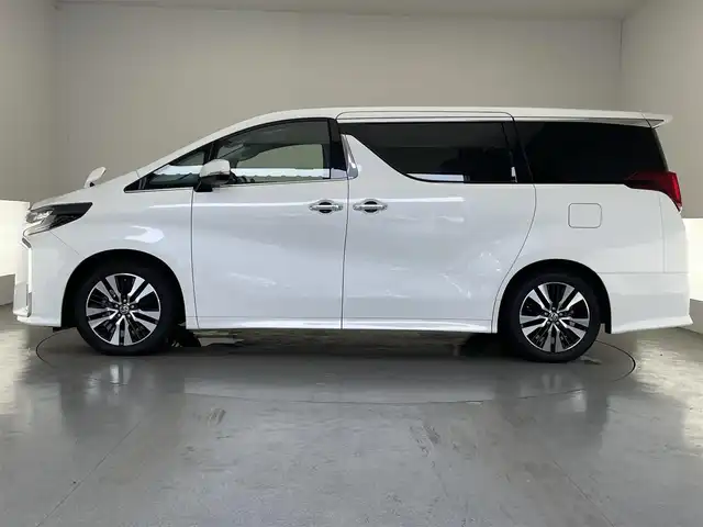 トヨタ アルファード S Cパッケージ 愛知県 2021(令3)年 2.3万km ホワイトパールクリスタルシャイン 純正９型ナビ　ＢＳＭ　三眼ＬＥＤ　純正フリップダウンモニター　デジイン　追従くクルコン　セーフティセンス　ミラキャスト　ｎａｎｏｅ　黒レザ‐　禁煙車　フルセグＴＶ　ＤＶＤ　車線逸脱　衝突軽減　両側パワスラ　エアシート　メモリーシート　１００V充電　ステアリングヒーター　フォグランプ　コーナーセンサー　Bluetooth　サンルーフ　オットマン　