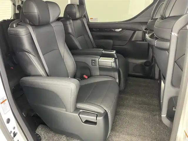 トヨタ アルファード S Cパッケージ 愛知県 2021(令3)年 2.3万km ホワイトパールクリスタルシャイン 純正９型ナビ　ＢＳＭ　三眼ＬＥＤ　純正フリップダウンモニター　デジイン　追従くクルコン　セーフティセンス　ミラキャスト　ｎａｎｏｅ　黒レザ‐　禁煙車　フルセグＴＶ　ＤＶＤ　車線逸脱　衝突軽減　両側パワスラ　エアシート　メモリーシート　１００V充電　ステアリングヒーター　フォグランプ　コーナーセンサー　Bluetooth　サンルーフ　オットマン　
