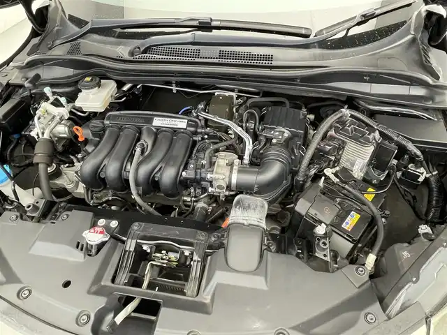 ホンダ ヴェゼル ハイブリッド Z ホンダセンシング 滋賀県 2020(令2)年 6.3万km クリスタルブラックパール 純正8インチナビ/Bluetooth/CD/DVD/iPod/AUX/フルセグTV/バックカメラ/追従クルーズコントロール/ホンダセンシング/ハーフレザーシート/シートヒーター/純正17インチアルミホイール/ETC