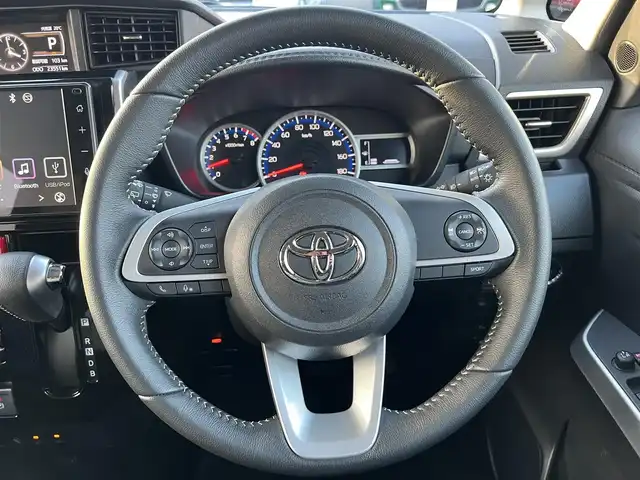 トヨタ ルーミー カスタムG－T 三重県 2022(令4)年 2.4万km クールバイオレットクリスタルシャイン 純正9インチディスプレイオーディオ（AppleCarplay/AndroidAuto/Bluetooth/AM/FM/地デジTV/USB)/ディスプレイオーディオパッケージ（外部入力用USB端子/GPSアンテナ/バックカメラ/ステアリングスイッチ）/コンフォートパッケージ（シートヒーター/シートバックテーブル）/スマートアシスト（衝突回避支援ブレーキ/衝突警報/車線逸脱警報/ふらつき警報/ブレーキ制御付誤発進抑制/サイドビューランプ/先行車発進お知らせ/コーナーセンサー/アダプティブクルーズコントロール/アダプティブドライビングビーム/路外逸脱警報/標識認識）/ウェルカムパワースライドドア（運転席側/助手席側）/LEDヘッドランプ/オートライト/スペアキー/キーフリーシステム/175/55R15タイヤ/15インチホイール/シルバー加飾付ピアノブラックセンターパネル/オートエアコン/充電用USB端子/シルバー加飾付ステアリングホイール/ステアリングスイッチ（カラーマルチインフォメーションディスプレイ/アダプテイブクルーズコントロール/スポーツモード）/撥水機能付ブラックファブリックシート