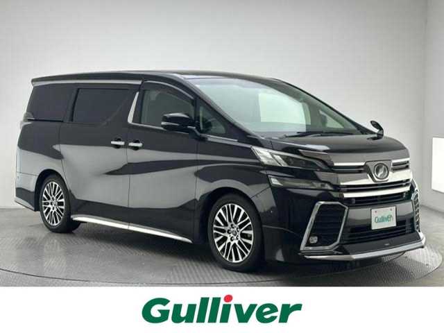 トヨタ ヴェルファイア Z Gエディション 兵庫県 2015(平27)年 3.9万km バーニングブラッククリスタルシャインガラスフレーク 純正9.2型SDナビゲーション/フルセグ/CD/DVD/SDREC/AUX/Bt/USB　/バックモニター/両側電動スライドドア【サンシェード】/レーダークルーズコントロール/プリクラッシュセーフティシステム/インテリジェントパーキングアシスト２/前後クリアランスソナー/コンビシート/運転席メモリーシート/前席パワーシート/助手席パワーオットマン/2列目エグゼクティブパワーシート【オットマン】/コンビステアリング/ステアリングヒーター/前後ドライブレコーダー/社外レーダー/社外ポータルデジタルミラー/自動防眩ミラー/プッシュスタート/スマートキー/純正18インチアルミホイール/電格ウインカーミラー/フロントモデリスタエアロ/純正サイドシル　リアスポイラー/LEDヘッドランプ/オートライト/フロントフォグランプ/スペアキー