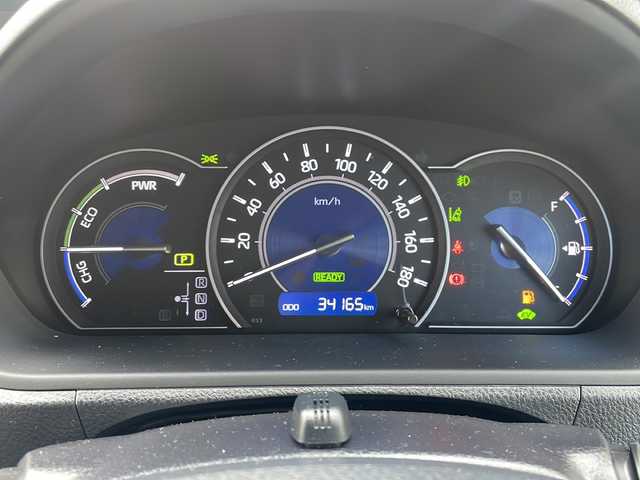 トヨタ ノア ハイブリッド Si 広島県 2017(平29)年 3.5万km ホワイトパールクリスタルシャイン 純正9インチナビ/(フルセグTV/CD/DVD/BT/AM/FM)/フリップダウンモニター/バックカメラ/衝突被害軽減システム/車線逸脱警報/クルーズコントロール/横滑り防止装置/ETC/アイドリングストップ/LEDヘッドライト/フォグランプ/オートライト/ウィンカーミラー/電動格納ミラー/純正１６インチAW/シートヒーター/シートリフター/プッシュスタート/スマートキー/フロアマット/ドアバイザー/スペアキー/取扱説明書/保証書