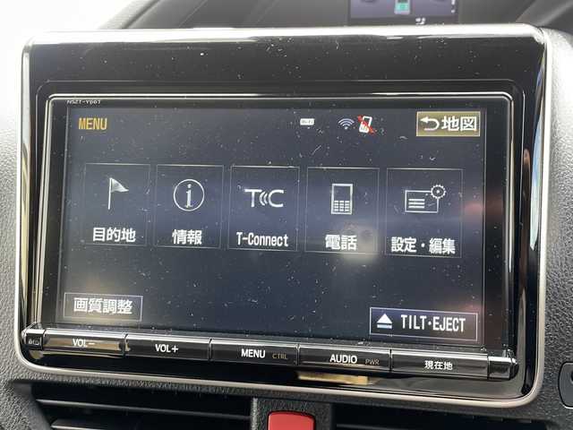 トヨタ ノア ハイブリッド Si 広島県 2017(平29)年 3.5万km ホワイトパールクリスタルシャイン 純正9インチナビ/(フルセグTV/CD/DVD/BT/AM/FM)/フリップダウンモニター/バックカメラ/衝突被害軽減システム/車線逸脱警報/クルーズコントロール/横滑り防止装置/ETC/アイドリングストップ/LEDヘッドライト/フォグランプ/オートライト/ウィンカーミラー/電動格納ミラー/純正１６インチAW/シートヒーター/シートリフター/プッシュスタート/スマートキー/フロアマット/ドアバイザー/スペアキー/取扱説明書/保証書