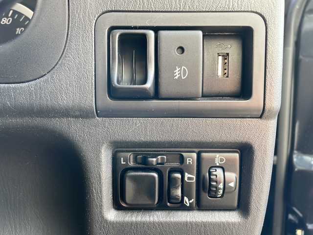 スズキ ジムニー クロスアドベンチャー 青森県 2014(平26)年 4.5万km ブルーイッシュブラックパール3 ・4WD/・黒×赤レザーシート/・社外SDナビ/　　（ワンセグTV/CD/SD)/・マッドフラップ/・バックカメラ/・フォグライト/・ウィンカーミラー/・純正マフラー積込/・純正フロントグリル積込/・運転席シートヒーター/・前後ドライブレコーダー/・背面タイヤ（ハードカバー）/・キーレスエントリー/・ETC/・ドアバイザー