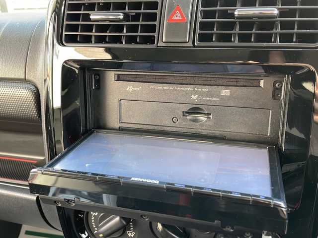 スズキ ジムニー クロスアドベンチャー 青森県 2014(平26)年 4.5万km ブルーイッシュブラックパール3 ・4WD/・黒×赤レザーシート/・社外SDナビ/　　（ワンセグTV/CD/SD)/・マッドフラップ/・バックカメラ/・フォグライト/・ウィンカーミラー/・純正マフラー積込/・純正フロントグリル積込/・運転席シートヒーター/・前後ドライブレコーダー/・背面タイヤ（ハードカバー）/・キーレスエントリー/・ETC/・ドアバイザー