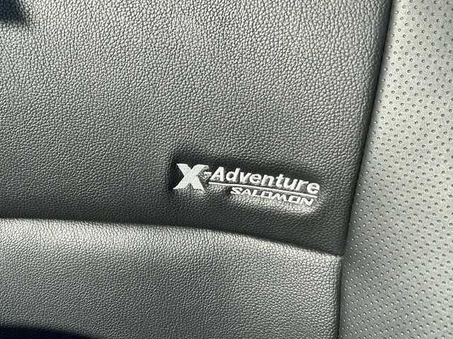 スズキ ジムニー クロスアドベンチャー 青森県 2014(平26)年 4.5万km ブルーイッシュブラックパール3 ・4WD/・黒×赤レザーシート/・社外SDナビ/　　（ワンセグTV/CD/SD)/・マッドフラップ/・バックカメラ/・フォグライト/・ウィンカーミラー/・純正マフラー積込/・純正フロントグリル積込/・運転席シートヒーター/・前後ドライブレコーダー/・背面タイヤ（ハードカバー）/・キーレスエントリー/・ETC/・ドアバイザー