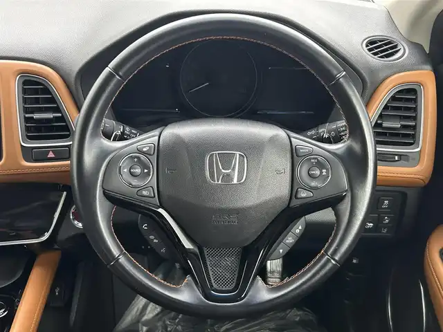 ホンダ ヴェゼル ハイブリッド Z ホンダセンシング 埼玉県 2016(平28)年 6.9万km ホワイトオーキッドパール 純正ナビ　温ヒーター　ＥＴＣ　Ｂカメラ　ＬＥＤヘッドライト　ハーフレザーシート　フルセグＴＶ　オートハイビーム　レーンキープ　衝突被害軽減　ＭＴモード付ＡＴ アダプティブクルーズコントロール