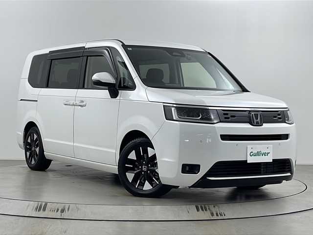 ホンダ ステップワゴン eHEV エアー 埼玉県 2022(令4)年 2.1万km プラチナホワイトパール 純正ナビ　/　AM/FM/CD/DVD/BT/フルセグ/バックカメラ　/前後ドライブレコーダー　/レーダークルーズコントロール　/ＥＴＣ　/ブレードホールド/電子パーキング/レーンキープアシスト　/衝突軽減システム　/両側パワースライドドア　/オートライト/LEDヘッドライト/フォグランプ/純正１６インチアルミホイール　/純正フロアマット/ドアバイザー/ロールサンシェード/ウィンカーミラー