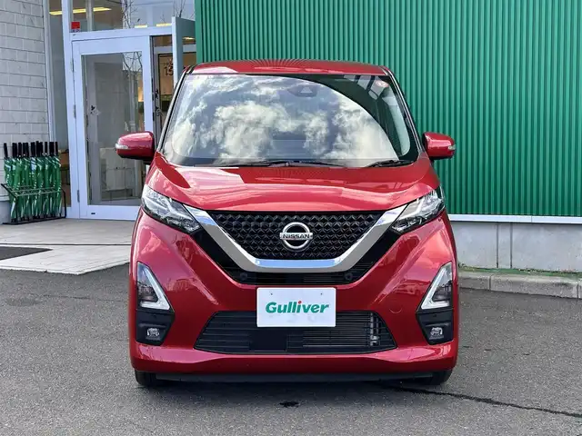 日産 デイズ HWS X プロパイロットED 宮城県 2021(令3)年 1.8万km スパークリングレッドM プロパイロット/インテリジェントエマージェンシーブレーキ/車線逸脱警報機能/車線逸脱防止支援システム/踏み間違い衝突防止アシスト/前方衝突予測警報/ふらつき警報/標識検知機能/先行車発進お知らせ/フロント・バックソアー/インテリジェントアラウンドビューモニター/純正9インチナビ(MM320D-L)/フルセグTV/Bluetooth/CD/DVD/SD/AUX/ナビ連動型ドライブレコーダー/純正ETC2.0/電動パーキングブレーキ/ブレーキホールド/LEDヘッドライト/フォグランプ/オートライト/ハイビームアシスト/ウインカーミラー/純正14インチAW/保証書/取扱説明書