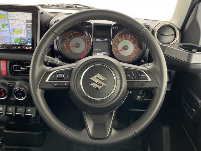 スズキ ジムニー シエラ JC 愛知県 2023(令5)年 1.7万km ミディアムグレー 9型ナビ/クルーズコントロール/シートヒーター/バックカメラ/純正アルミホイール/LEDヘッドライト/オートマチックハイビーム/ダウンヒルアシストコントロール/ドライブレコーダー/ETC/衝突軽減システム/フルセグ/CD DVD/Bluetooth/ステアリングスイッチ/スマートキー/プッシュスタート