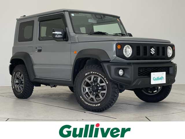 スズキ ジムニー シエラ JC 愛知県 2023(令5)年 1.7万km ミディアムグレー 9型ナビ/クルーズコントロール/シートヒーター/バックカメラ/純正アルミホイール/LEDヘッドライト/オートマチックハイビーム/ダウンヒルアシストコントロール/ドライブレコーダー/ETC/衝突軽減システム/フルセグ/CD DVD/Bluetooth/ステアリングスイッチ/スマートキー/プッシュスタート